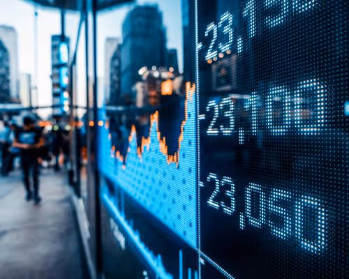 Digital stock market graph and price figures displayed on an urban building glass with blurred city street and pedestrians in background.